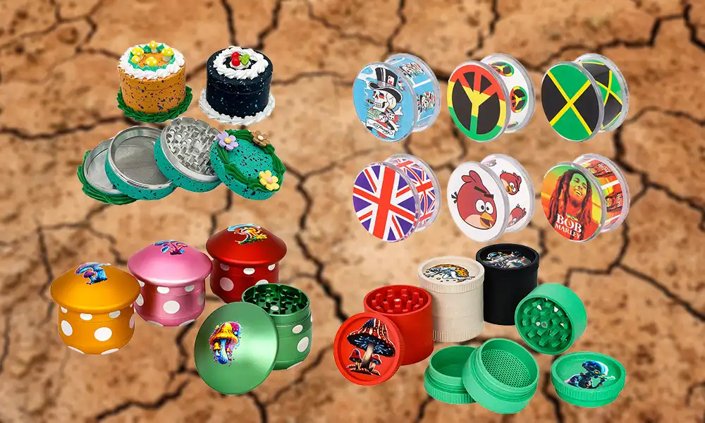 Assortment of metal grinders with diverse patterns: cartoon characters, flags, peace signs, and nature-inspired designs. Grinders have various finishes.